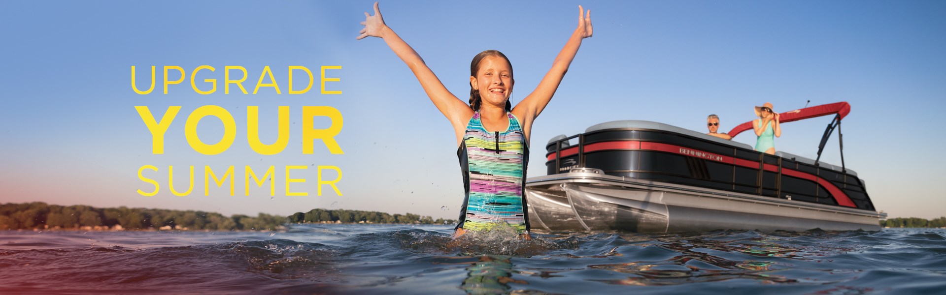 Family riding in a Bennington Pontoon boat in the middle of the water.